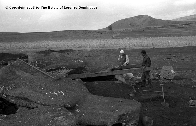 AKI_Tareas_01.jpg - Easter Island. 1960. Ahu Akivi. Raising the moai in 1960. Restoration of the ahu  by William Mulloy.