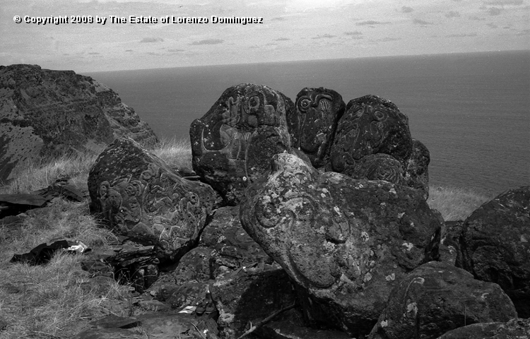 ORO_037.jpg - Easter Island. 1960. Orongo. Rocks on the cliffs with petroglyphs representing birdmen.