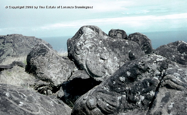 ORO_057.jpg - Easter Island. 1960. Orongo. Rocks on the cliffs with petroglyphs representing birdmen.