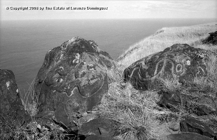 ORO_064.jpg - Easter Island. 1960. Orongo. Rocks on the cliffs with petroglyphs representing birdmen.