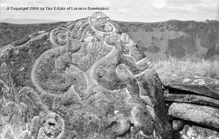 ORO_065.jpg - Easter Island. 1960. Orongo. Rocks on the cliffs with petroglyphs representing birdmen and makemake.